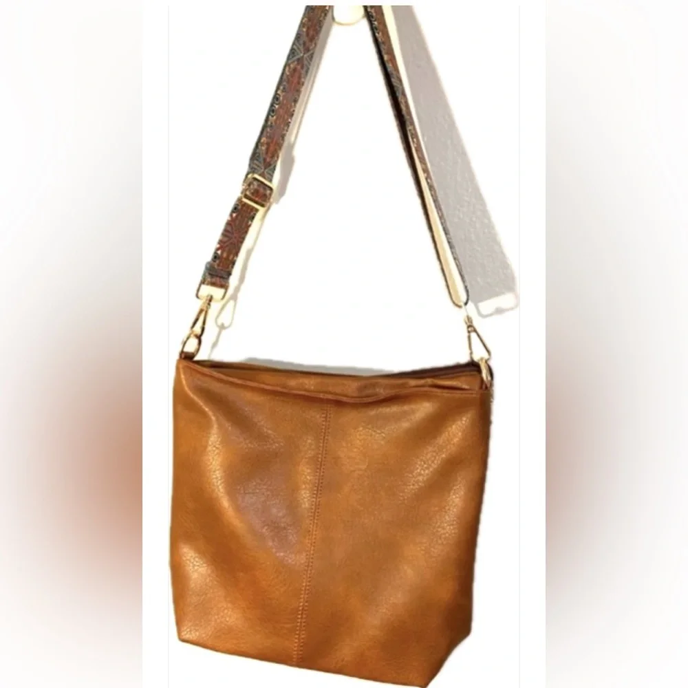NWOT Hobo bag. Natural brown with colorful fabric adjustable strap.
